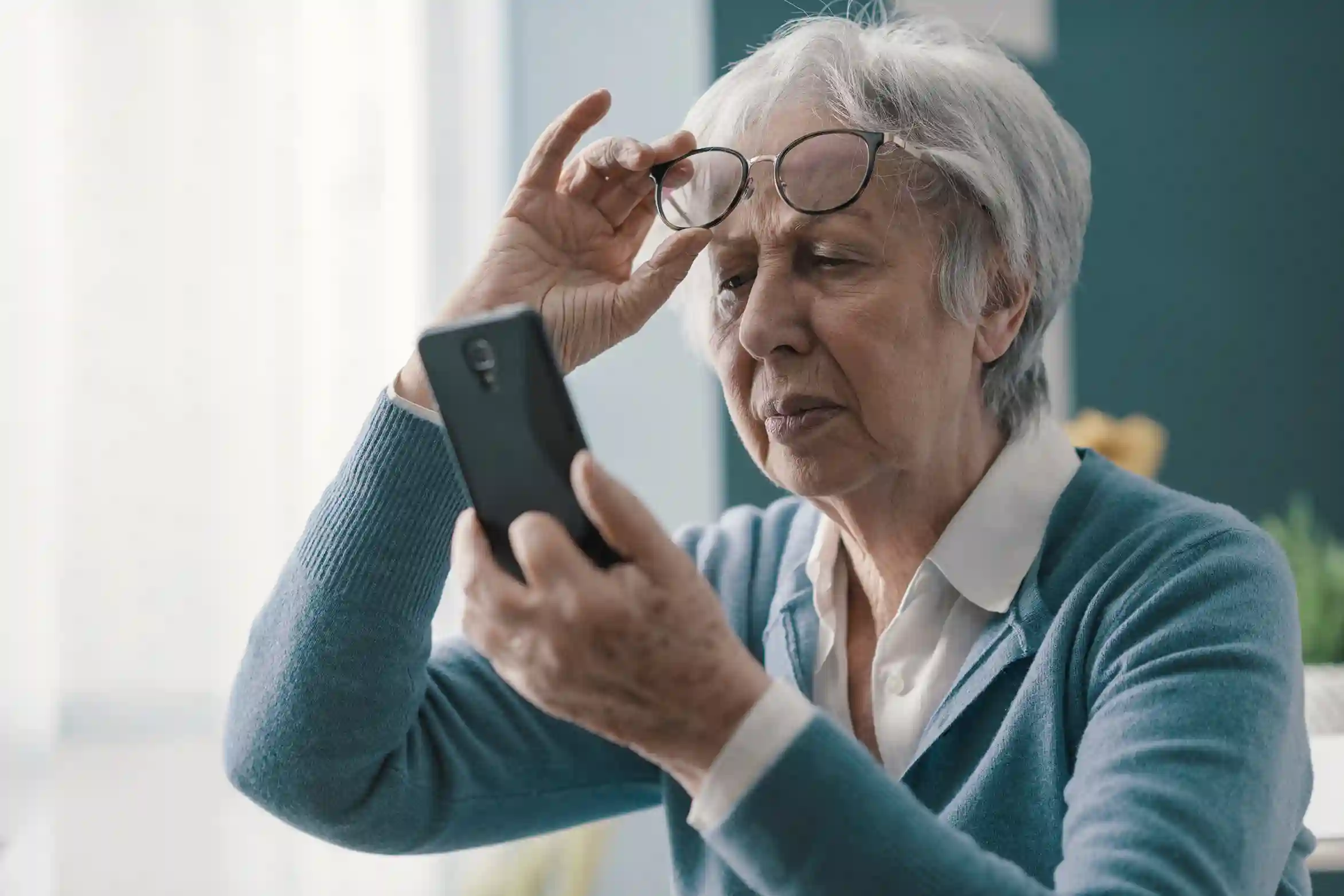 Aged Woman Struggling with Vision